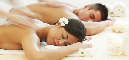 Young beautiful couple having a back massage